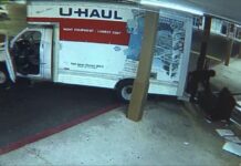 Surveillance video shows suspects using a U-Haul truck to steal an ATM from a laundromat in Mableton, Cobb County